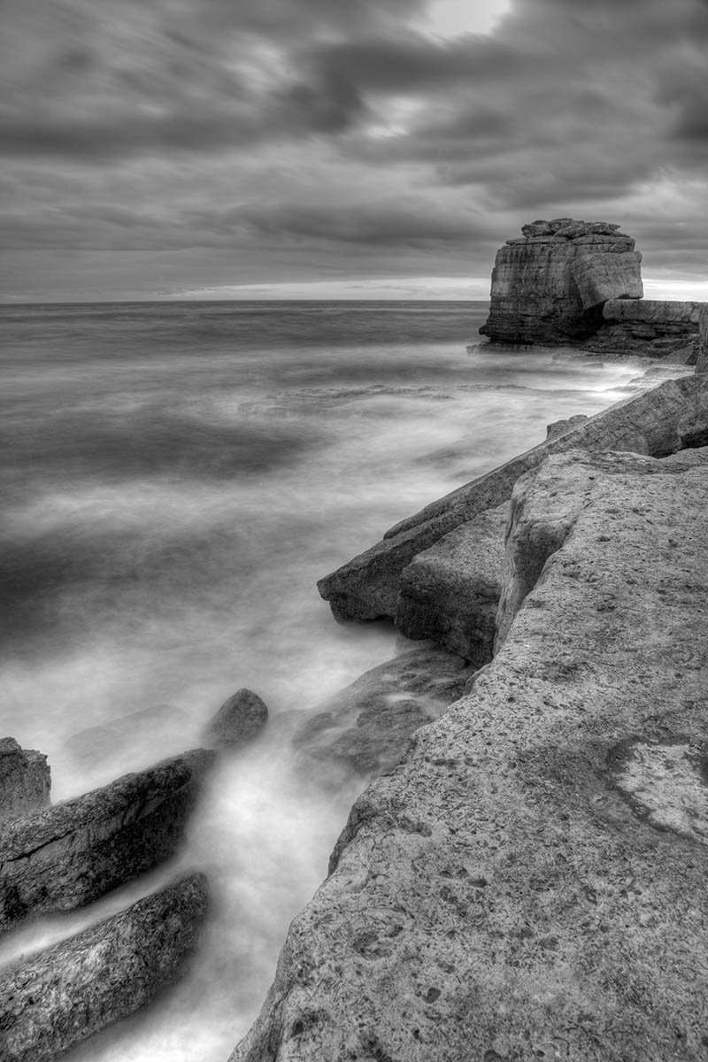 Pulpit rock in Black and white at Portland Bill, near Weymouth, Jurassic Coast, Dorset, England.