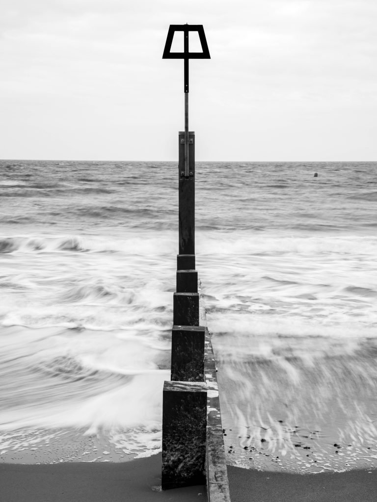 Black and white shot of Bournemouth groyne, Dorset, England