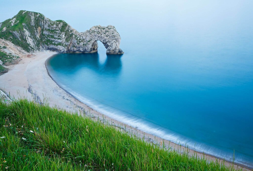 Evening view of Durdle Door beach, Dorset, England. Durdle door is one of the many stunning locations to visit on the Jurassic coast in southern England.