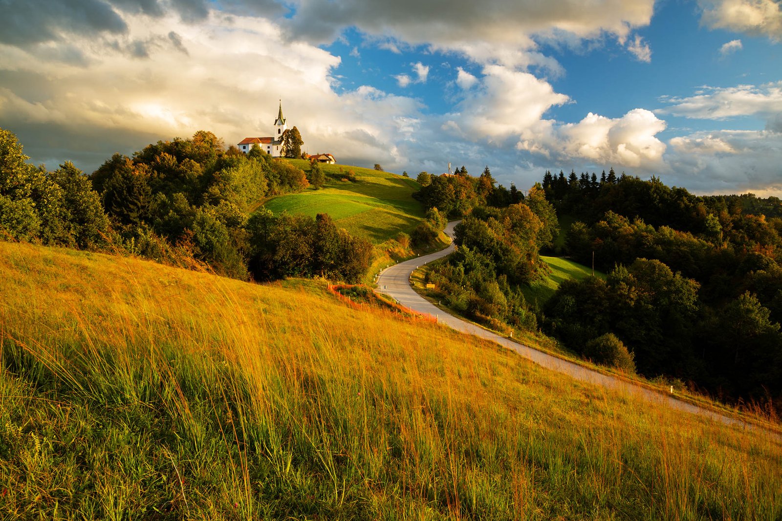 The church of Saint Margaret (Sveta Marjeta) at sunset in autumn. This church sits on a hill in the village of Prezganje in the hills to the east of Ljubljana, Slovenia.